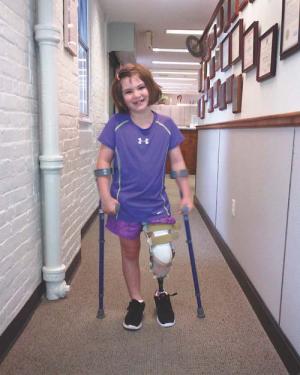 Jane Richard: The Richard family— whose eight-year-old son Martin was killed in the Patriot’s Day bombing at the Boston Marathon— last month released this photo of seven-year-old Jane Richard, who is now using a prosthesis to replace part of her left leg, which she lost in the attack.  	Photo courtesy Richard family